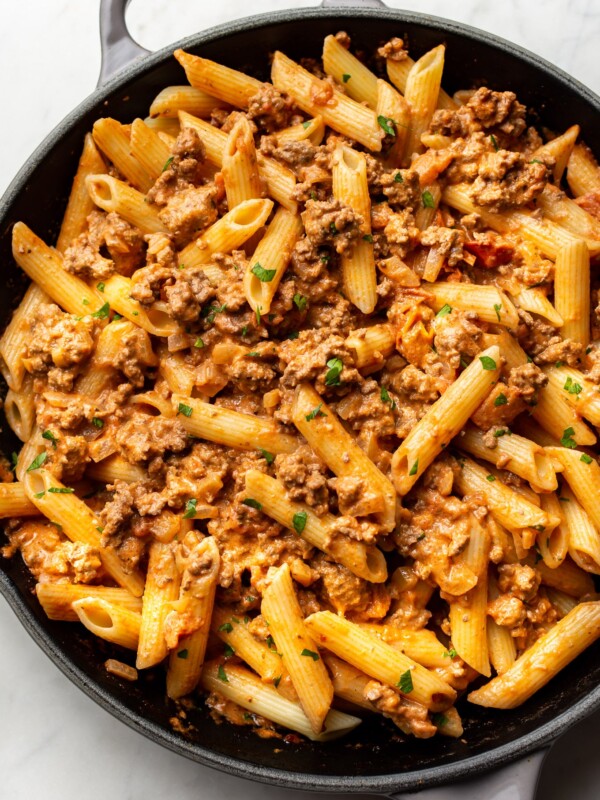 ground beef pasta in a skillet (sauce tossed with penne)