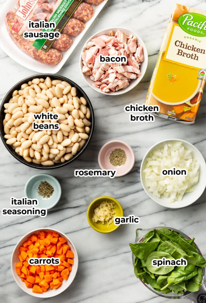 ingredients for italian sausage white bean soup in prep bowls