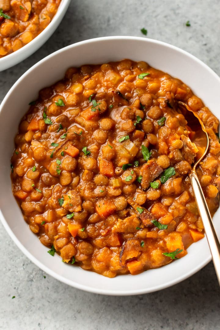 Instant Pot lentil stew in two white bowls