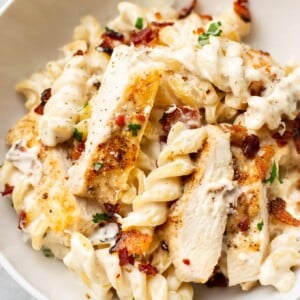 close-up of chicken bacon ranch pasta in a white bowl