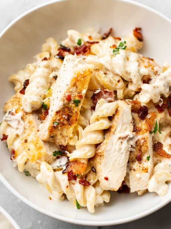 close-up of chicken bacon ranch pasta in a white bowl