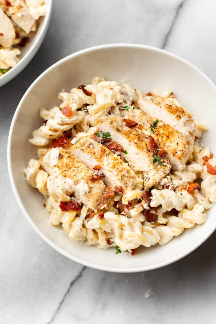 chicken bacon ranch pasta in a white bowl