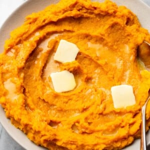 mashed butternut squash in a shallow serving bowl