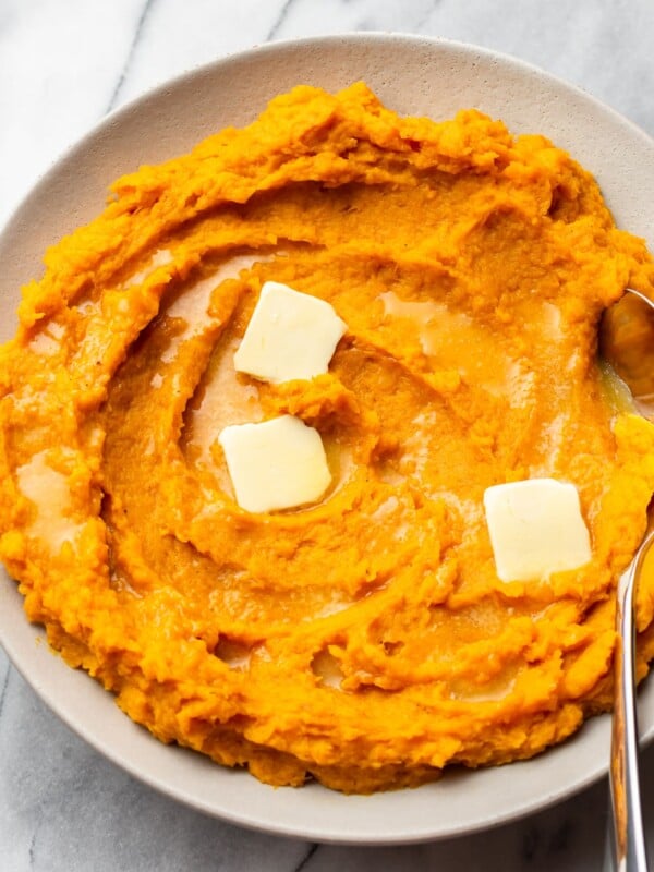 mashed butternut squash in a shallow serving bowl