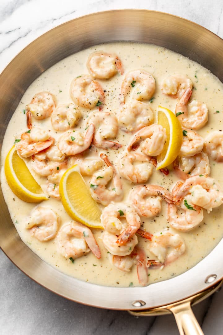 creamy shrimp (lemon garlic parmesan sauce) in a skillet