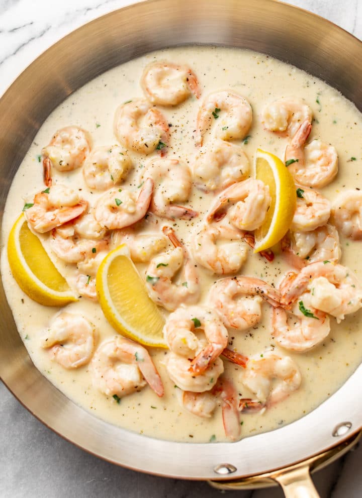 creamy shrimp (lemon garlic parmesan sauce) in a skillet