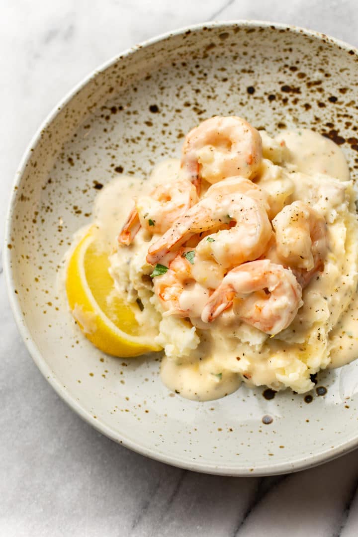 creamy garlic shrimp on a bed of mashed potatoes