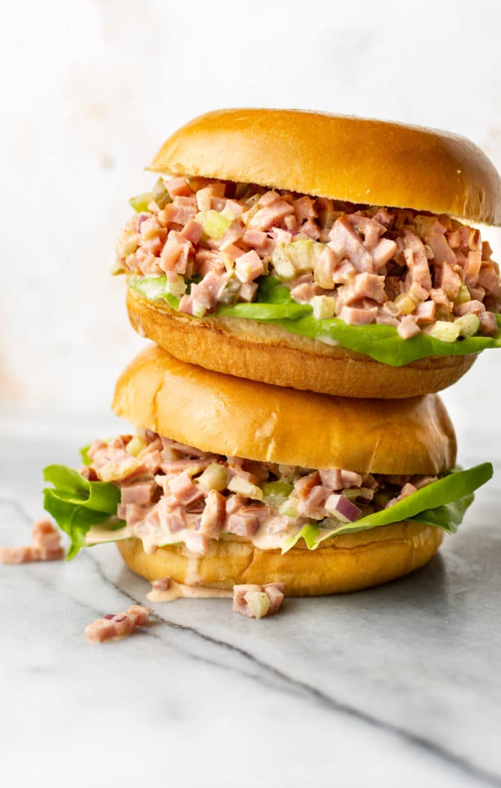 two ham salad sandwiches stacked on top of each other