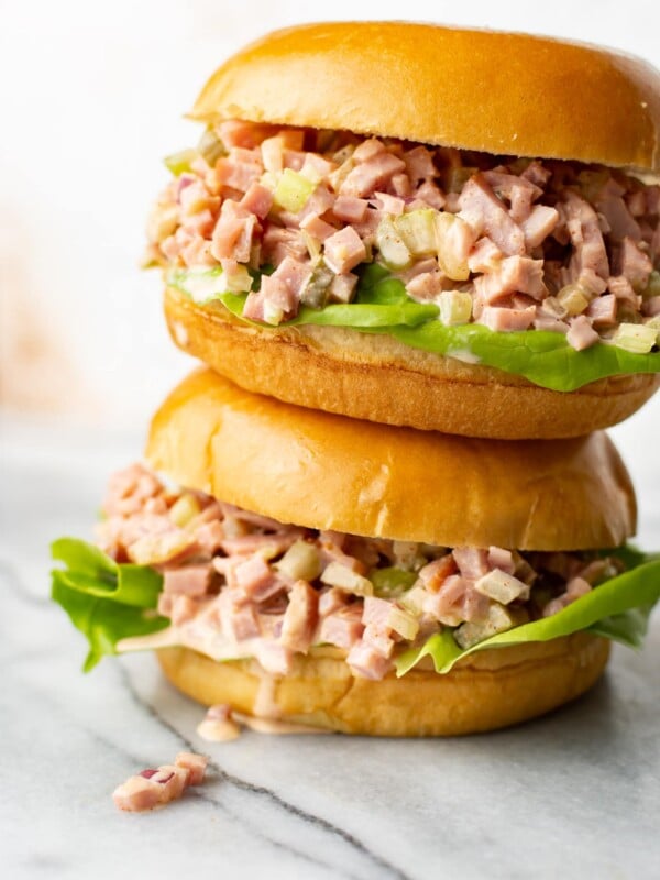 two ham salad sandwiches stacked on top of each other