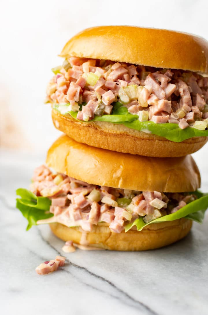 two ham salad sandwiches stacked on top of each other