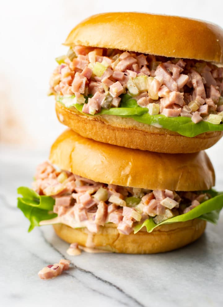 two ham salad sandwiches stacked on top of each other