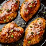 close-up of easy honey garlic chicken in a cast iron skillet