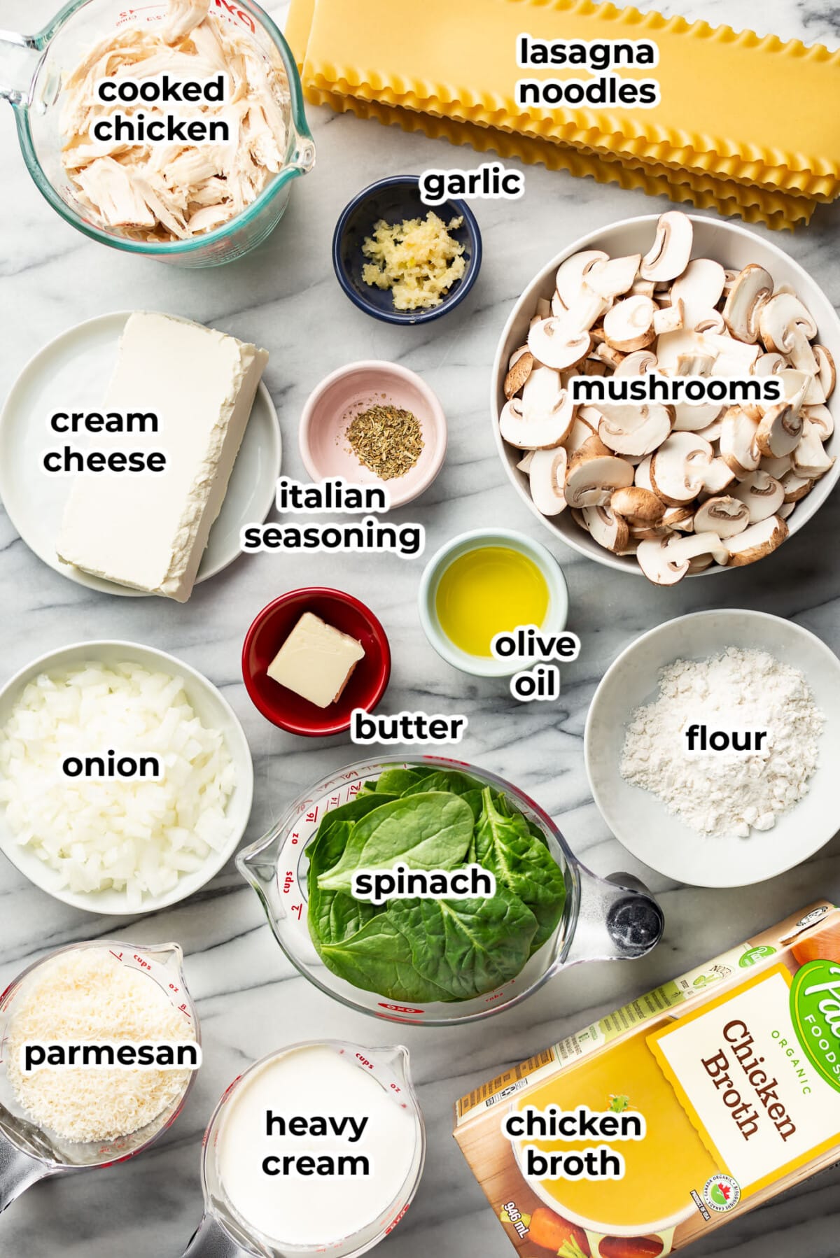 ingredients for white chicken lasagna soup in prep bowls