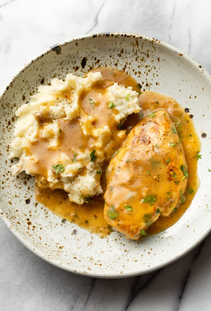 ranch chicken with mashed potatoes in a shallow bowl