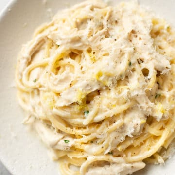 close-up of creamy lemon chicken pasta in a bowl
