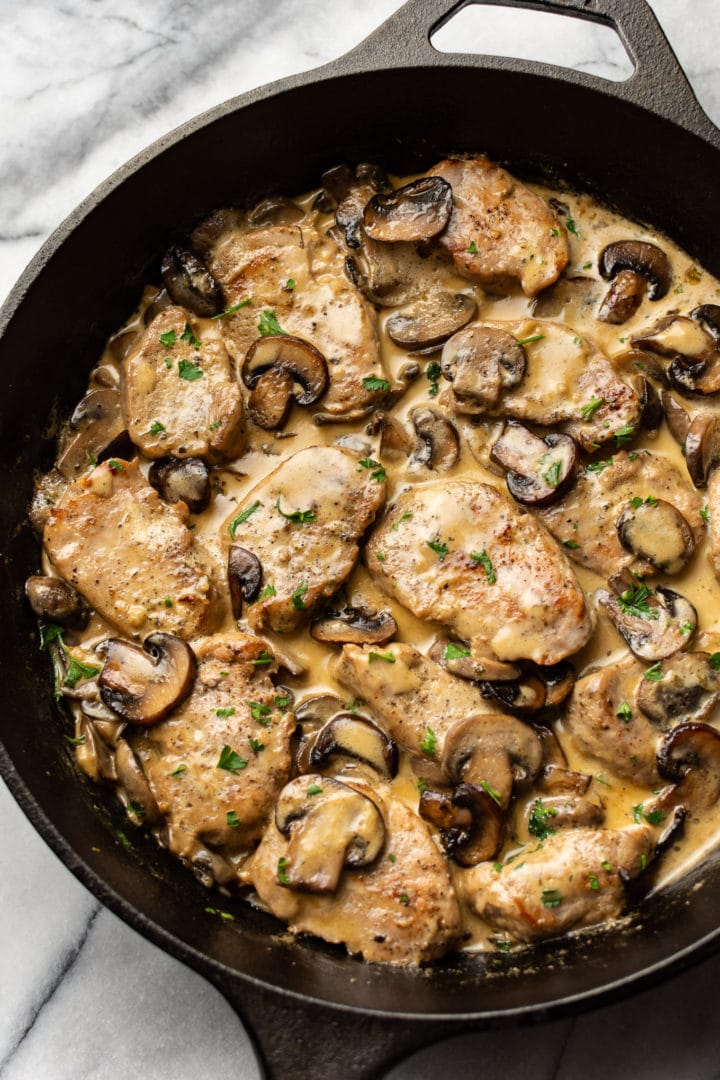 creamy mushroom pork tenderloin medallions in skillet