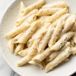 easy creamy penne pasta in a white bowl