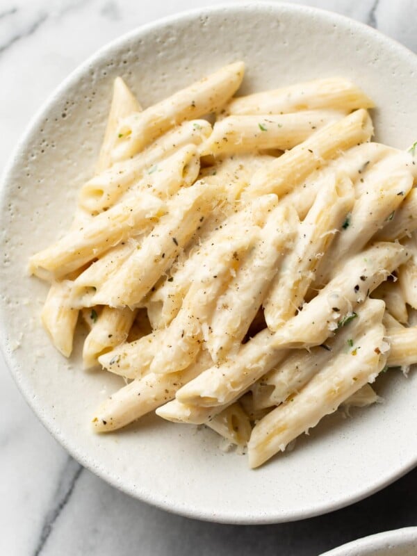 easy creamy penne pasta in a white bowl