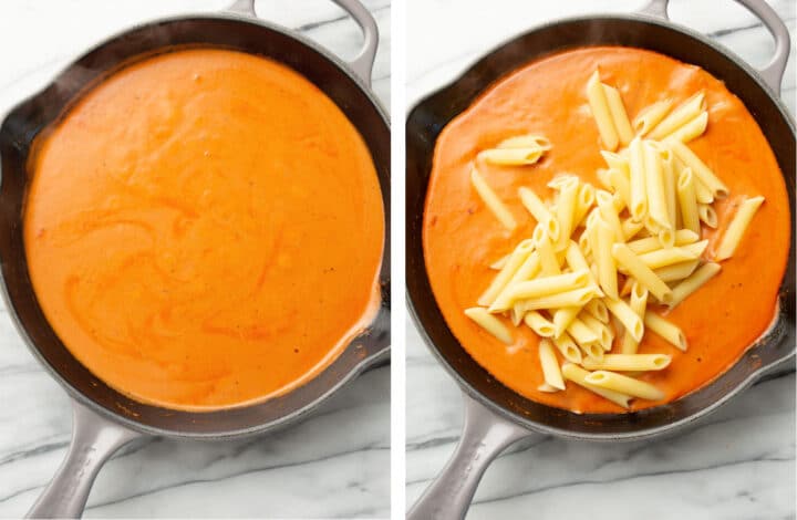 adding penne pasta to a skillet with creamy tomato sauce