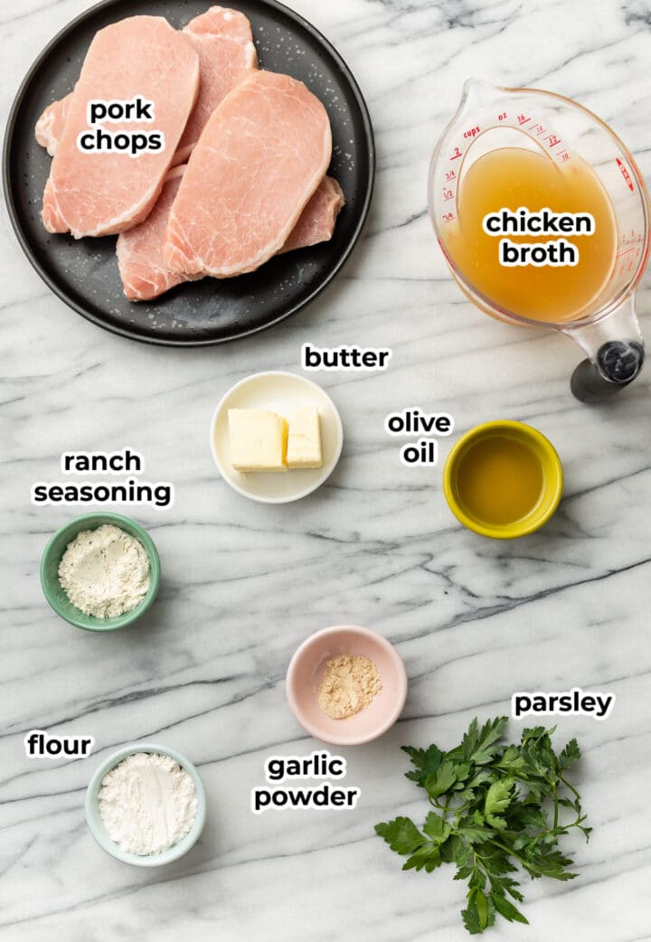 ingredients for ranch pork chops in prep bowls on a counter