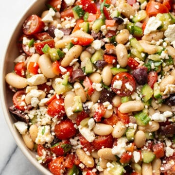 close-up of Greek white bean salad in a bowl