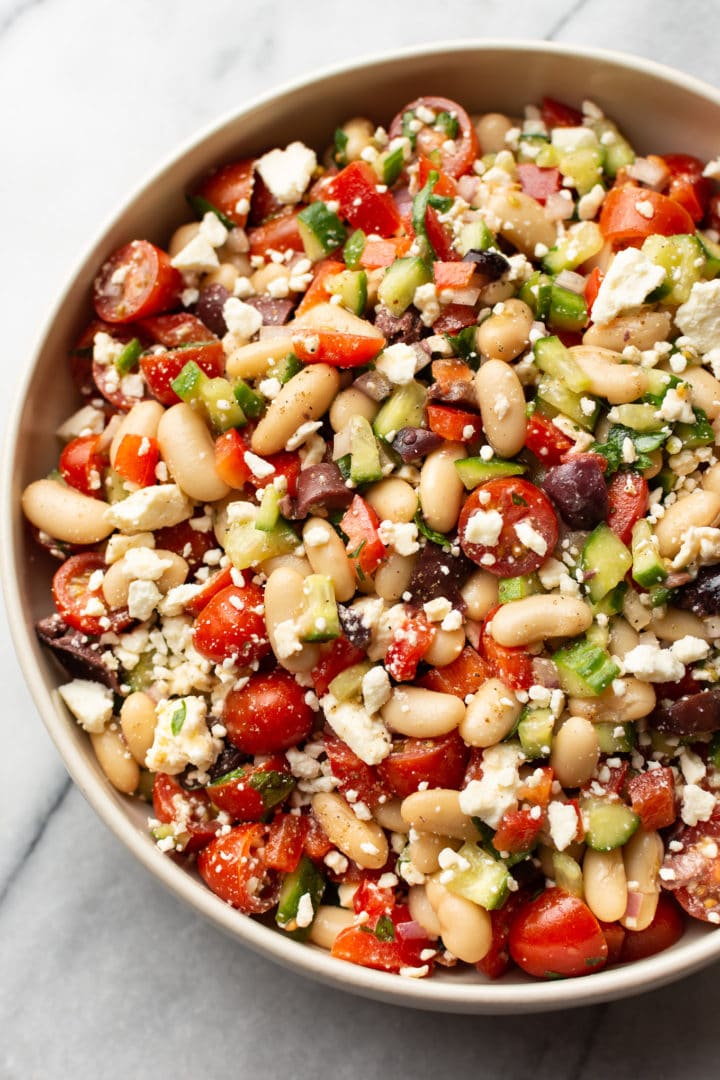 close-up of Greek white bean salad in a bowl