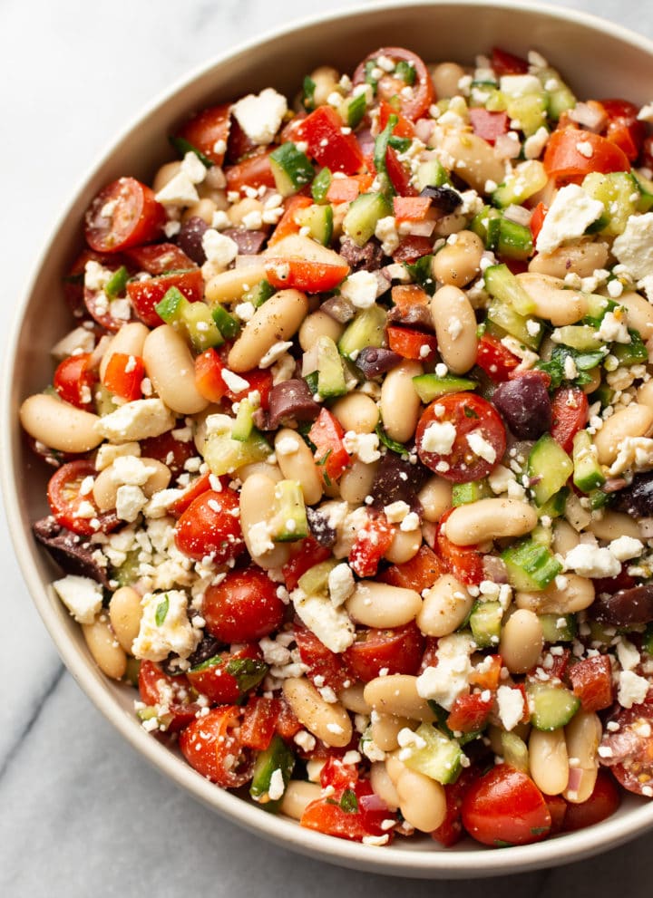 close-up of Greek white bean salad in a bowl