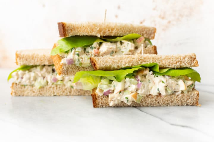 three homemade chicken salad sandwiches