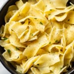 parmesan garlic butter noodles in a black bowl