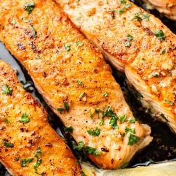 close-up of skillet garlic butter salmon