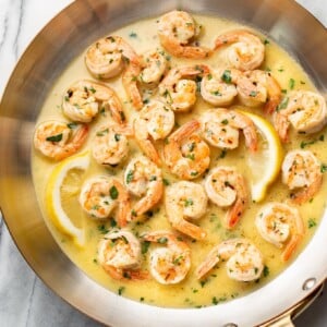 garlic butter shrimp scampi in a copper skillet