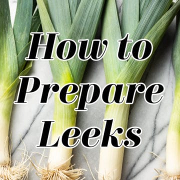 how to prepare leeks title graphic (text over a photo of four leeks)