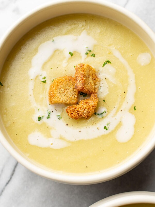 close-up of leek and potato soup in bowl topped with croutions