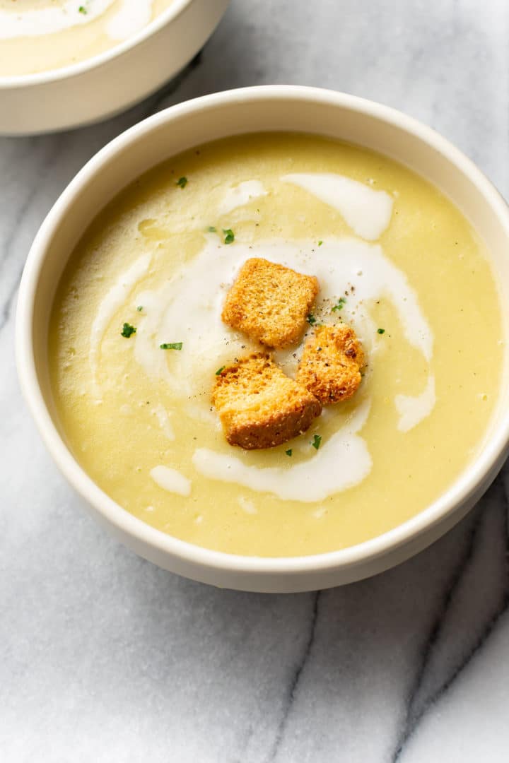 potato and leek soup in two bowls