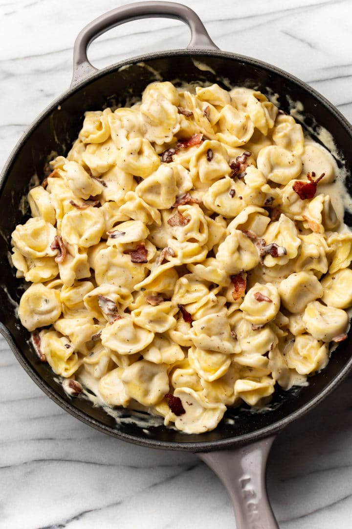 cream cheese tortellini with bacon and ranch in a skillet