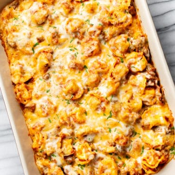 baked cheese tortellini in a casserole dish