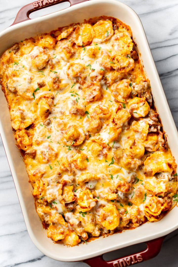 baked cheese tortellini in a casserole dish