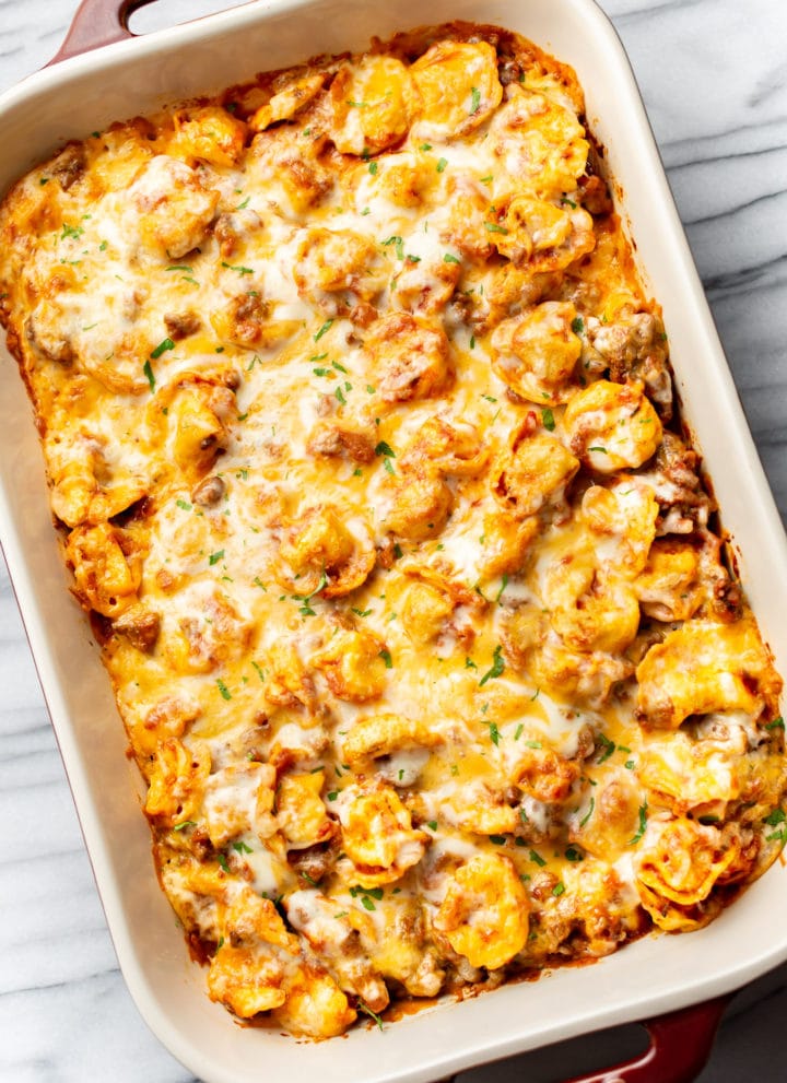 baked cheese tortellini in a casserole dish