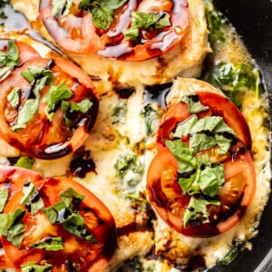 chicken caprese close-up in a skillet