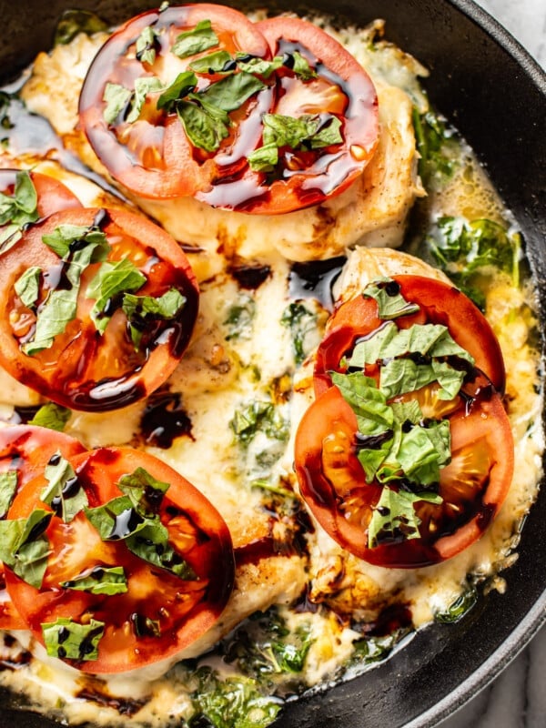 chicken caprese close-up in a skillet