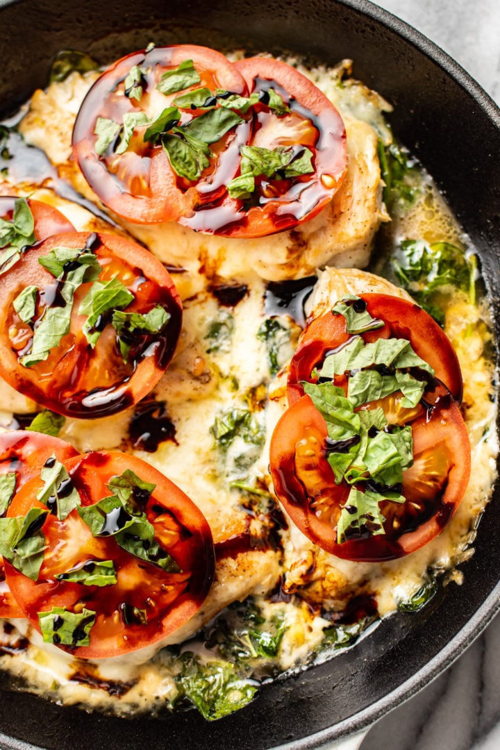 chicken caprese close-up in a skillet