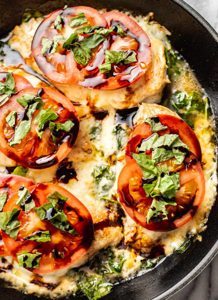 chicken caprese close-up in a skillet