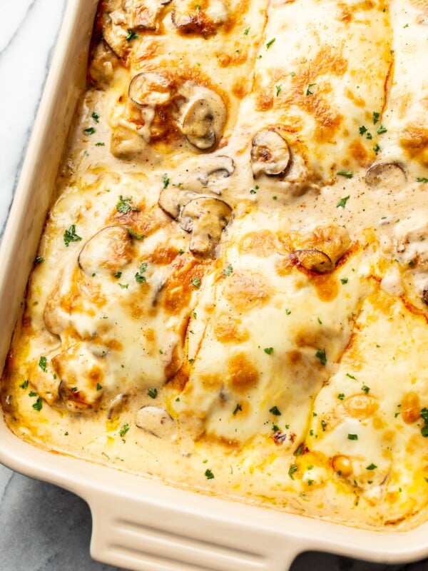 creamy, cheesy Chicken Gloria in a casserole dish close-up