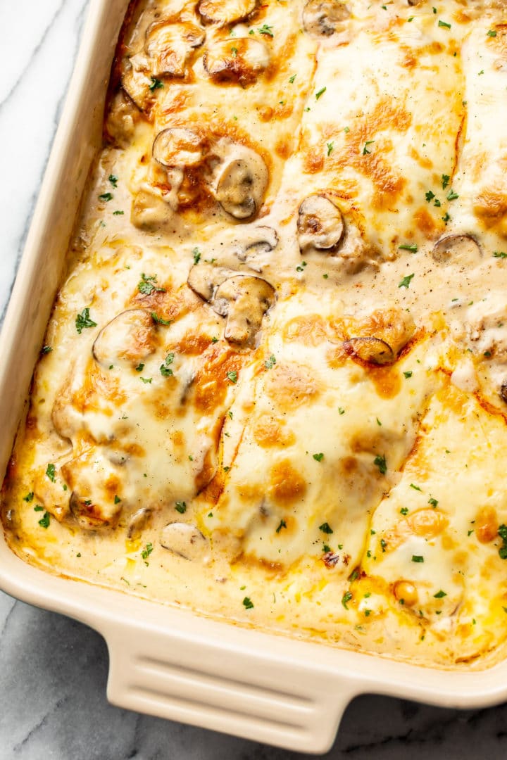 creamy, cheesy Chicken Gloria in a casserole dish close-up