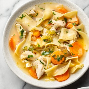 the best chicken noodle soup (in two bowls with one close-up)