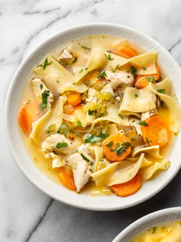 the best chicken noodle soup (in two bowls with one close-up)