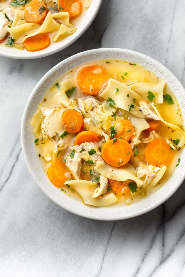 easy chicken noodle soup in two white bowls