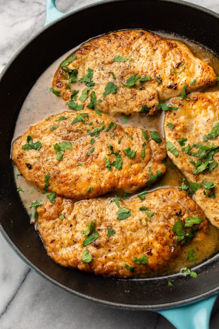 chicken scallopini in a skillet (close-up)