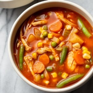 two bowls of chicken vegetable soup