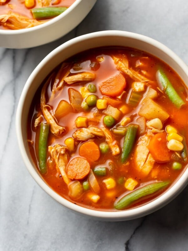 two bowls of chicken vegetable soup